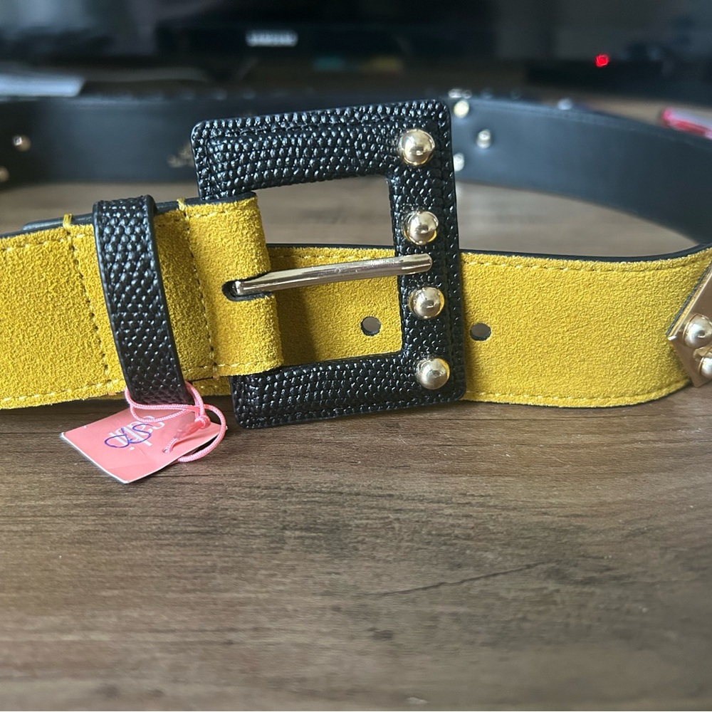 Cabi leather belt. Size medium. Black and mustard color. Brass studs.